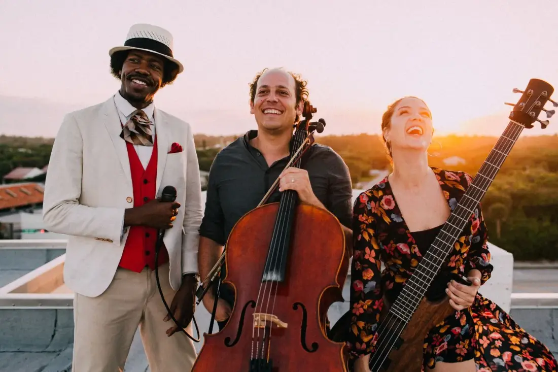 Biriba Union — three musicians on a Telluride rooftop at sunset