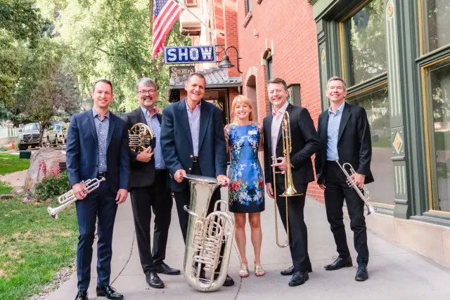 Claire Beard with the New York Philharmonic Principal Brass Quintet outside the Sheridan Opera House