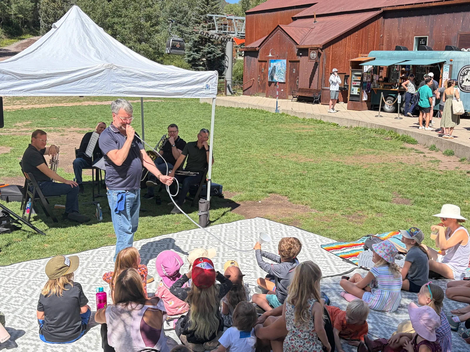 New York Philharmonic Principal Brass Quintet performing for kids and families at an outreach event